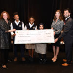 Left to right: Shannon Hunt, NPEF president and CEO; students from the Nashville Newcomer Academy; Dr. Kristin McGraner; and Sam Lingo, Nashville Entrepreneur Center president and COO.